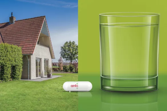 huis met tank en glas met pil